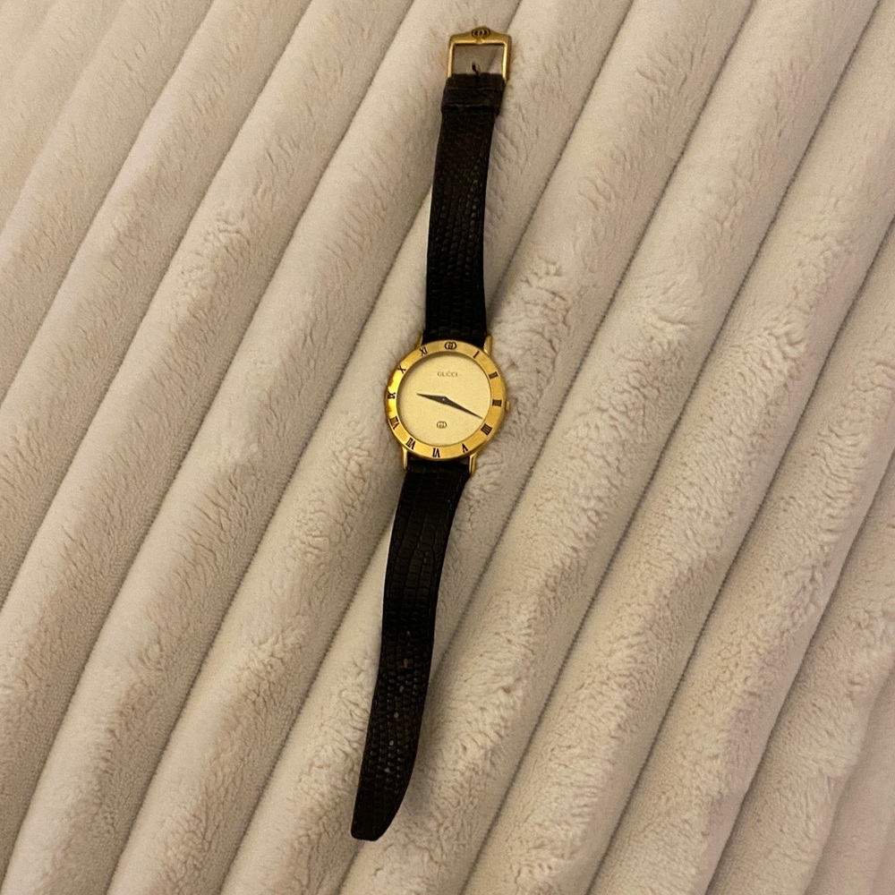Gucci Gold and Black Roman Numeral Watch